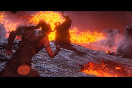 In a volcanic area, with lava flying upwards in front of her, and some lava on the floor next to her, Senua runs between statues of charred people moulded together by the lava. They all have their hands held up