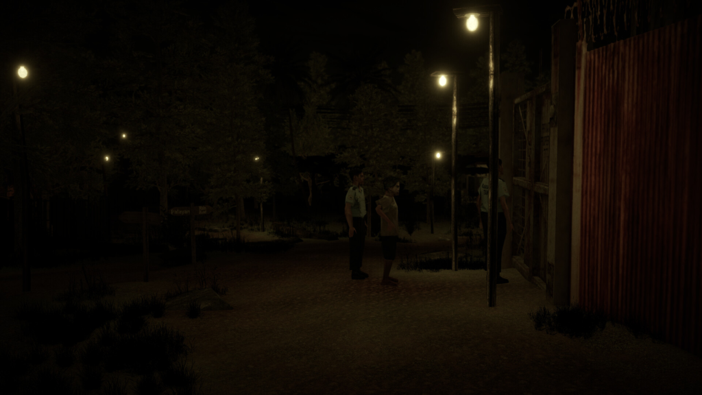 Barefoot boy standing between two uniformed men on a dark dirt road lit by street lamps in Hapunan